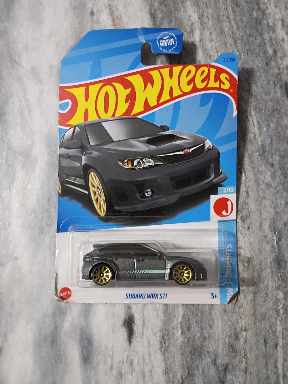 Mattel Hot Wheels Subaru WRX STI Toy Car - Black with Gold Wheels